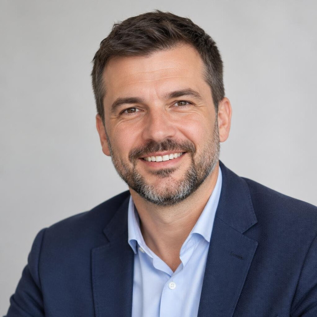 Portrait of a smiling bearded man professional